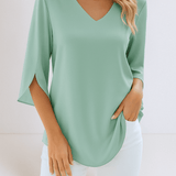 Top elegante con scollo a V e maniche aperte