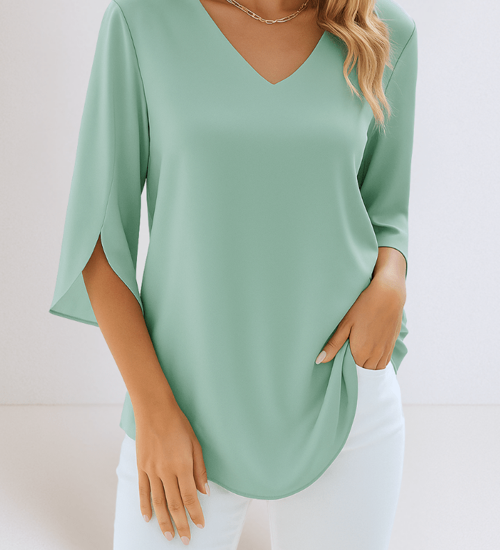 Top elegante con scollo a V e maniche aperte